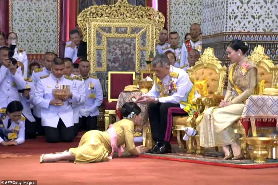 12382-6994403-Thailand_s_King_Maha_Vajiralongkorn_anointing_his_daughter_Princ-a-7_1557075560953.jpg