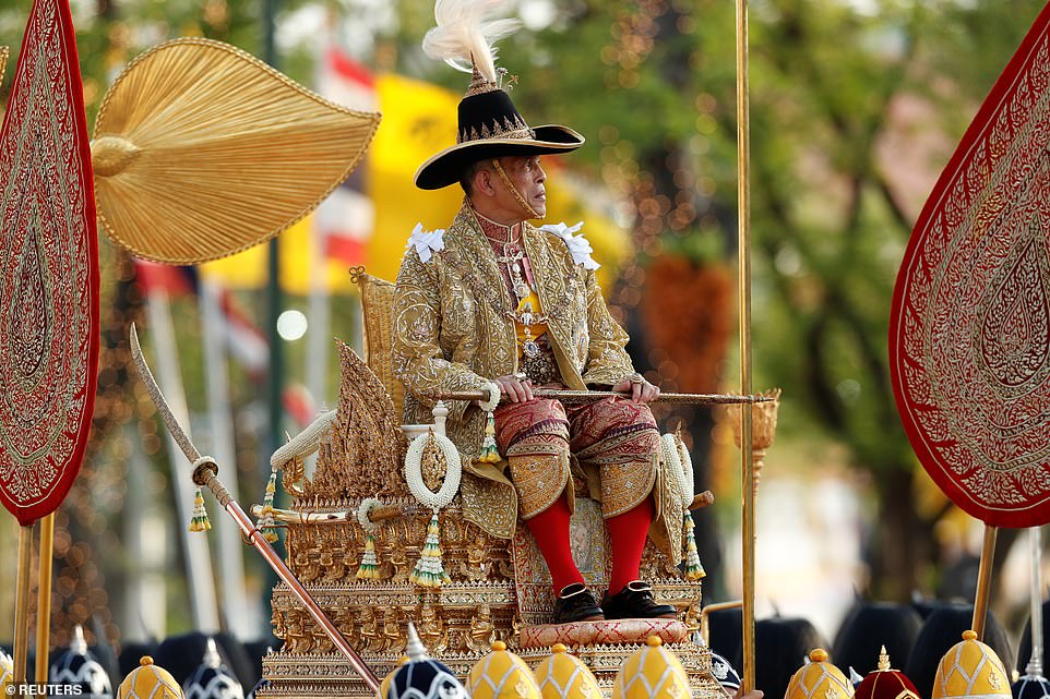 2458-6996795-Thailand_s_newly_crowned_King_Maha_Vajiralongkorn_is_seen_during-a-76_1557140617684.jpg
