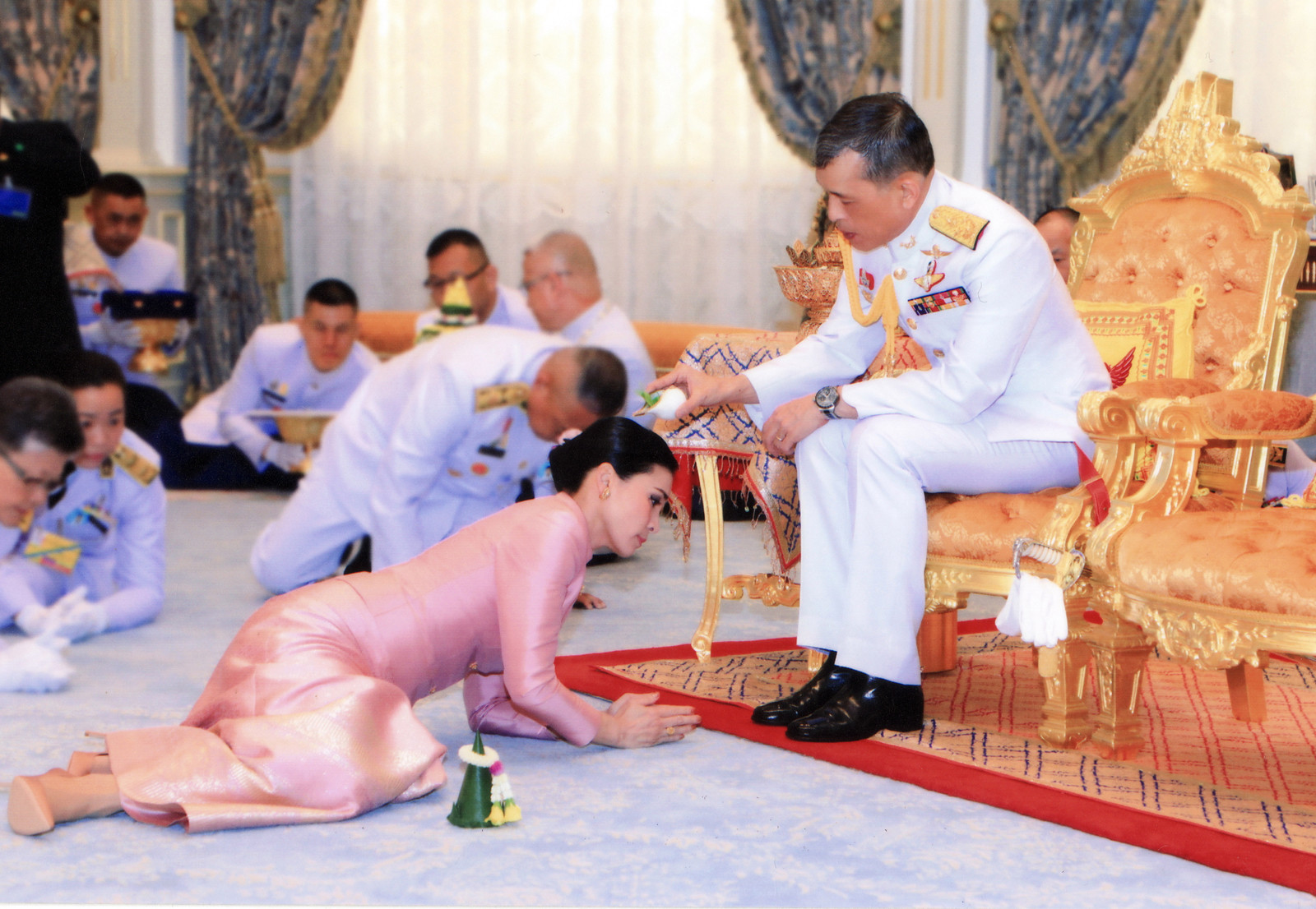 ess-lie-at-his-feet-as-he-makes-her-his-official-concubine-in-ceremony-attended-by-his-the-sun-3.jpg